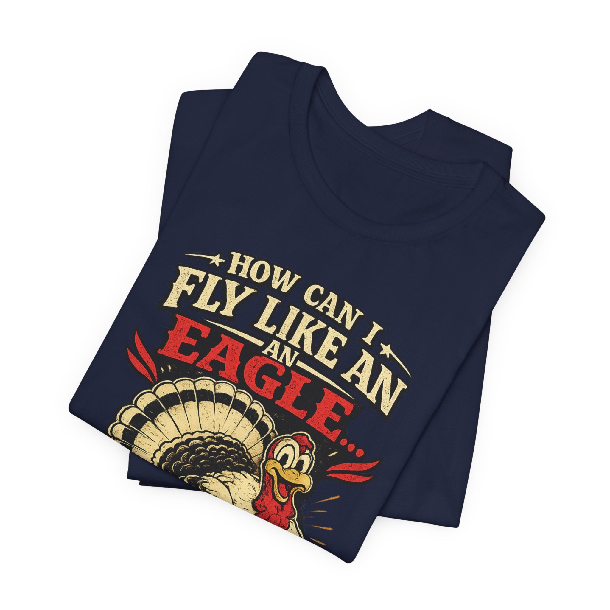 Funny Thanksgiving T-Shirt — "How Can I Fly Like an Eagle When I Work With a Bunch of Turkeys"